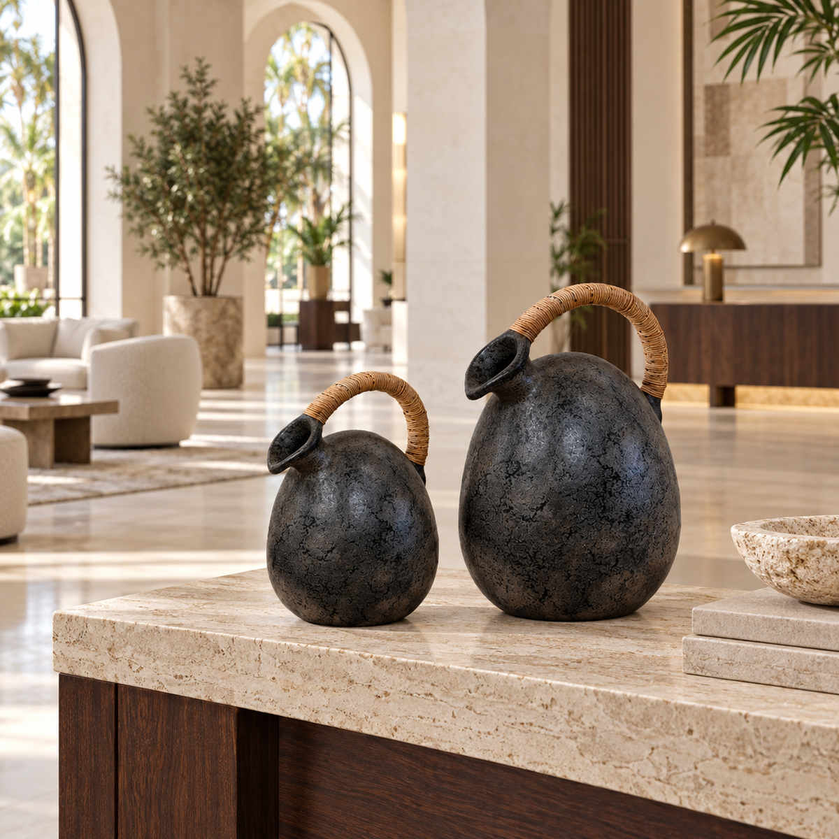 Makoa charcoal terracotta vase with a handwoven natural fiber handle