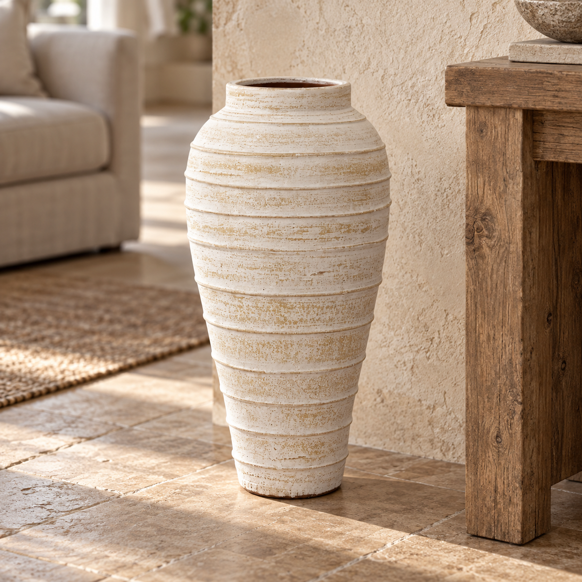Zola handcrafted clay floor vase with raised horizontal bands and a distressed warm-white finish